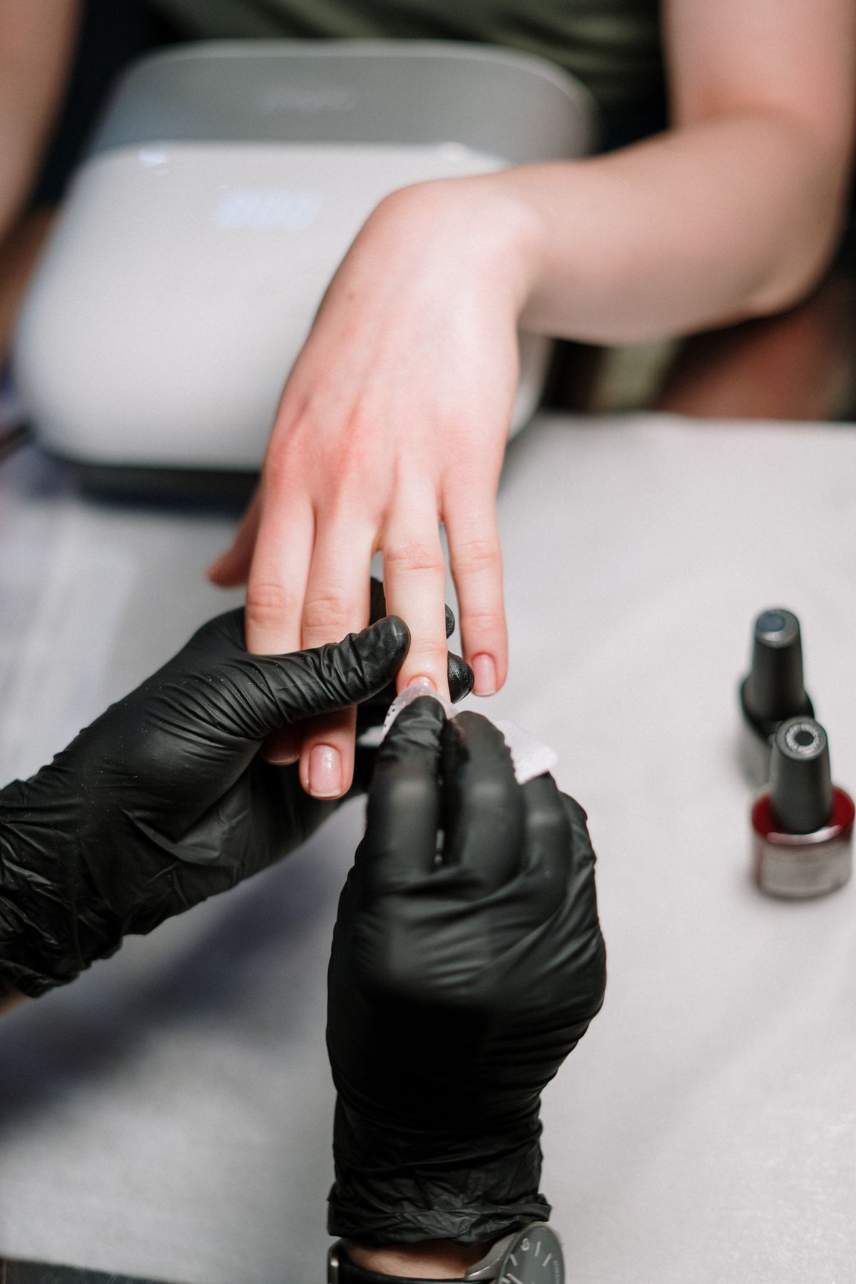 Manicure in progress at ClassieNailz Studio, Livonia
